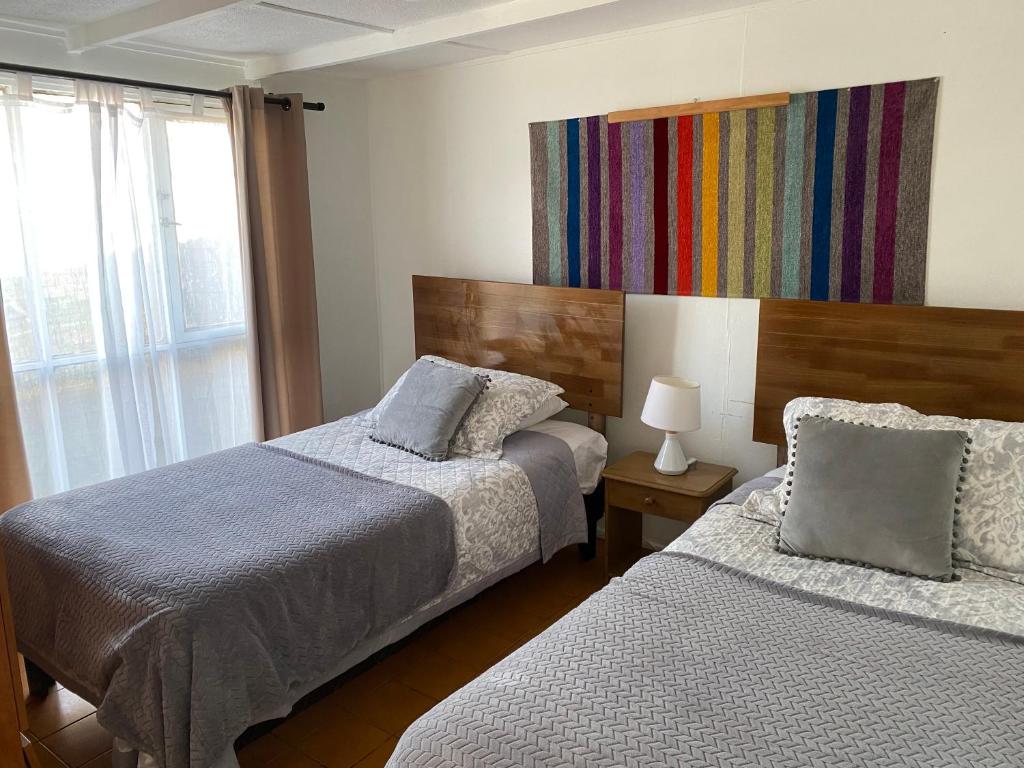 Dormitorio con dos camas